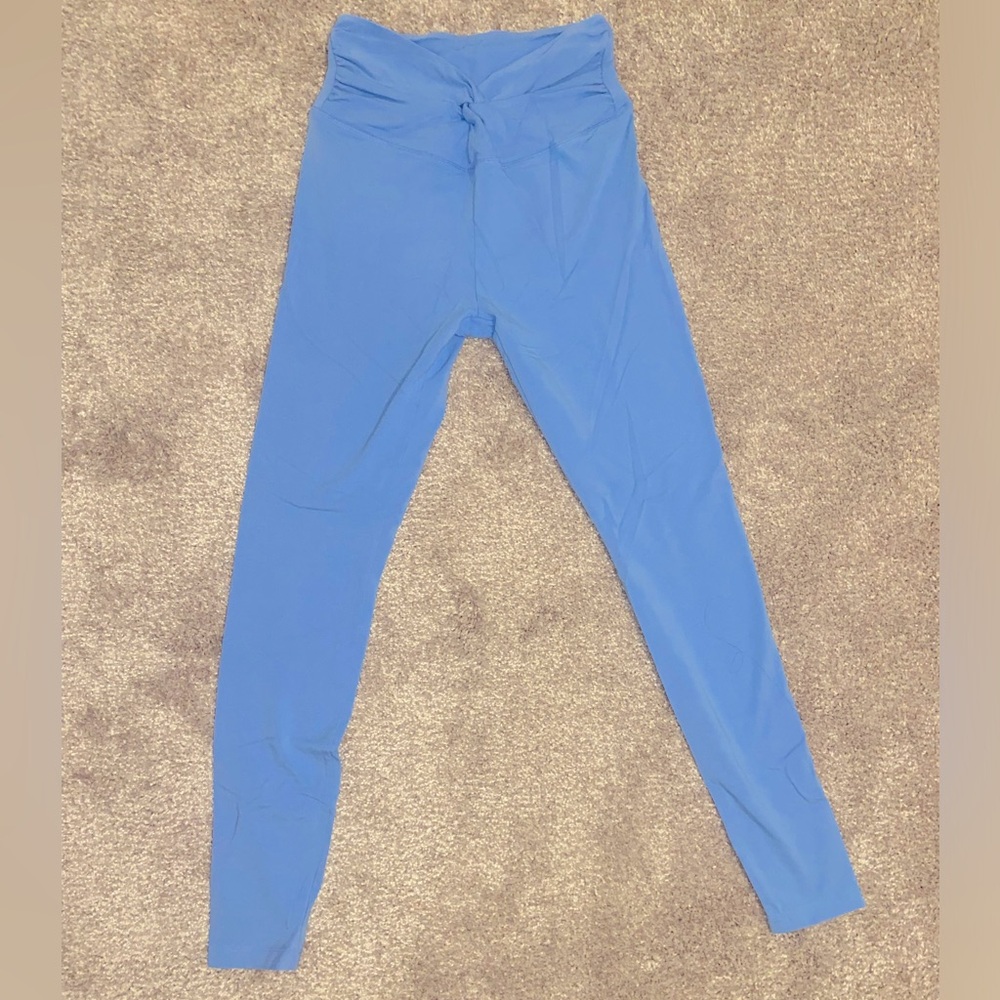 Pink size small leggings. Twist front